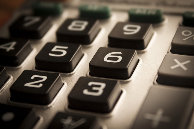 Face of calculator with numeric buttons showing.